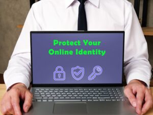 Business concept: The phrase "Protect Your Online Identity" written on a page.